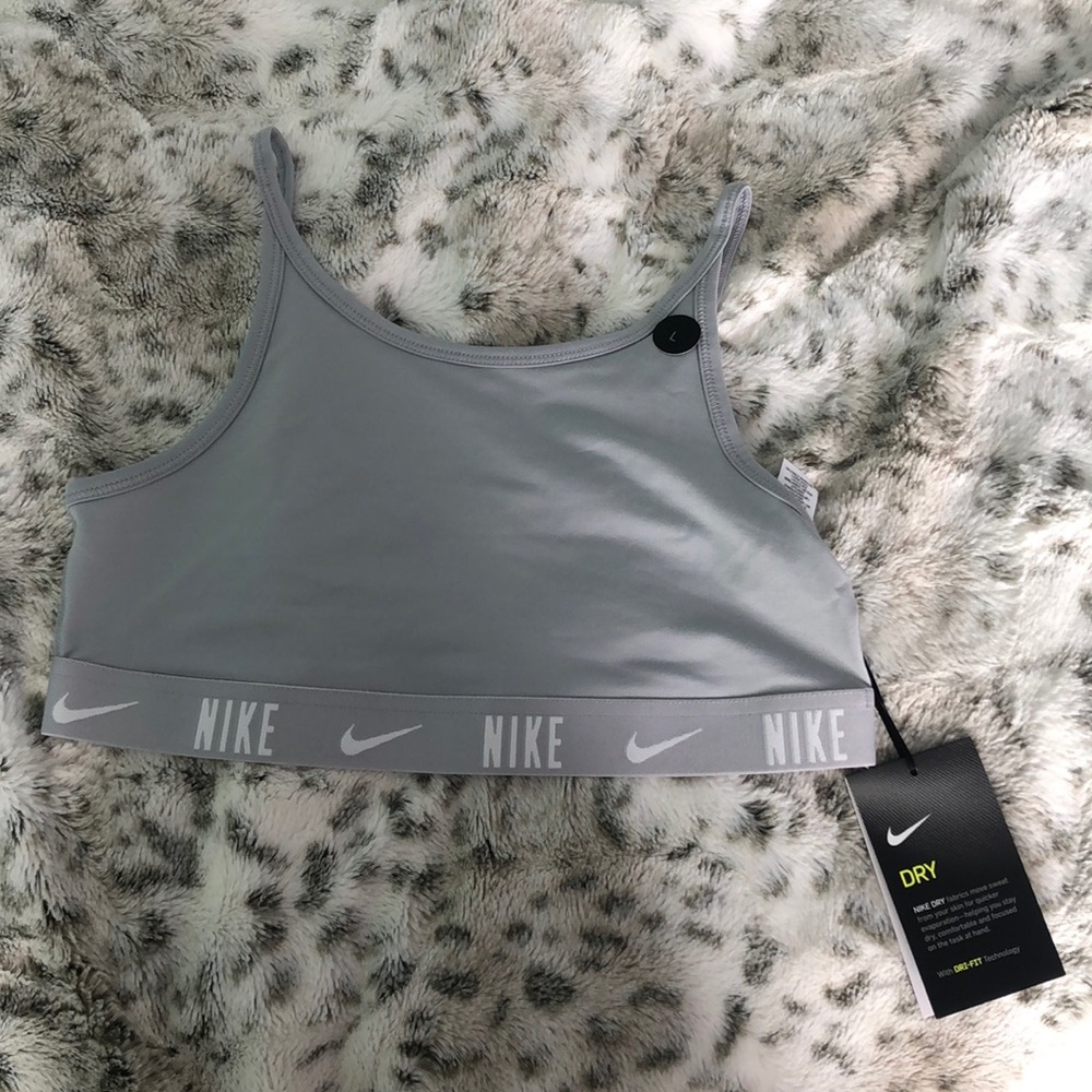 Gray and White Nike sports bra